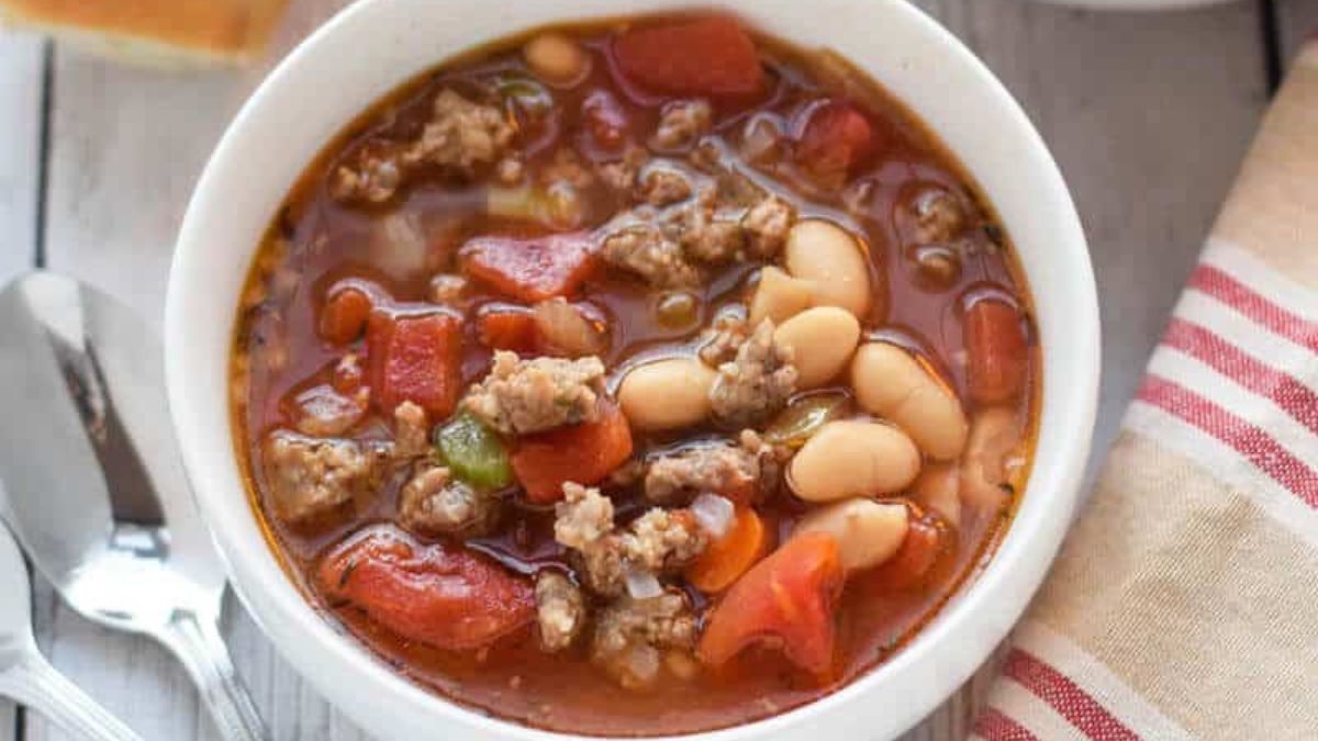 Bowl of sausage and bean soup.