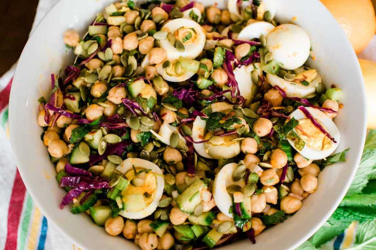 Spicy Chickpea Salad With Cucumber, Cilantro, & Eggs.