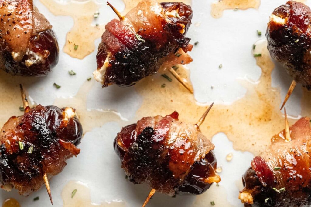 Bacon Wrapped Goat Cheese Stuffed Dates With Honey.